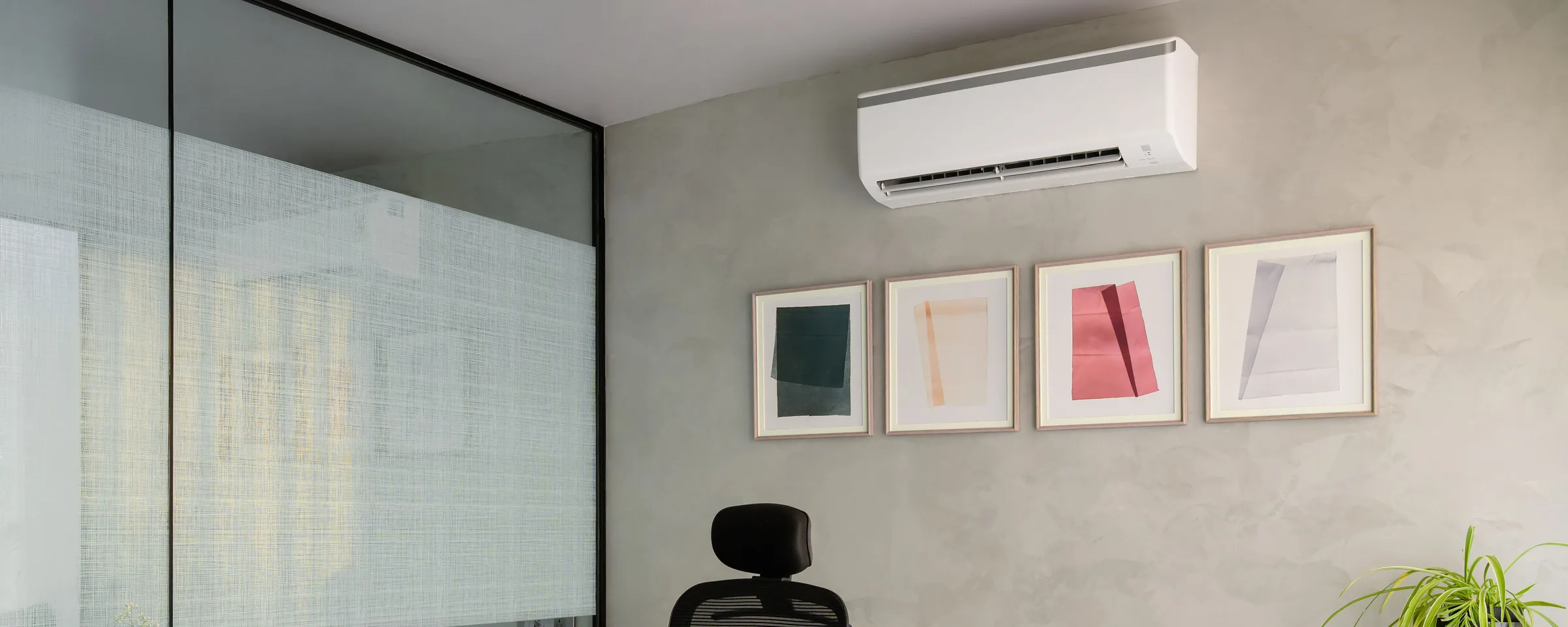 Modern office interior with discreet wall-mounted air conditioning